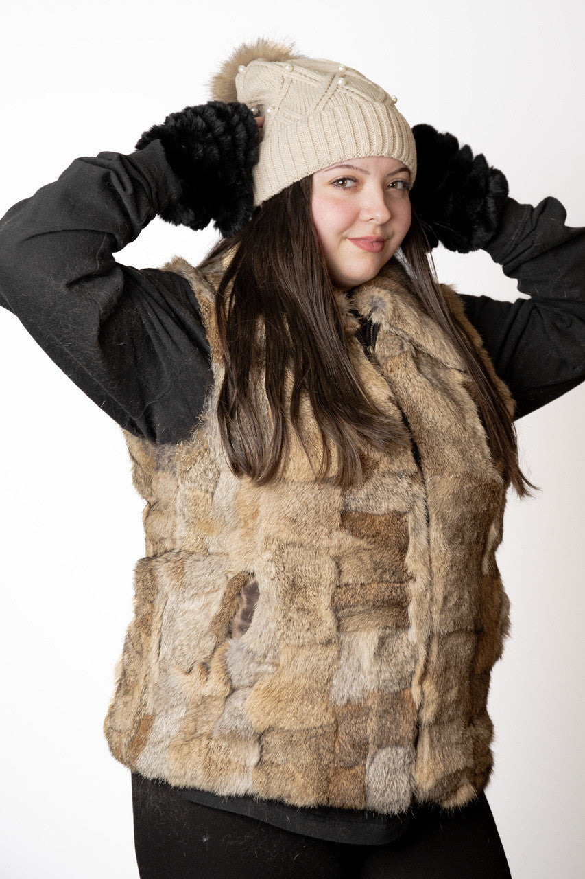 Women wearing a brown rabbit fur vest and a beige beanie