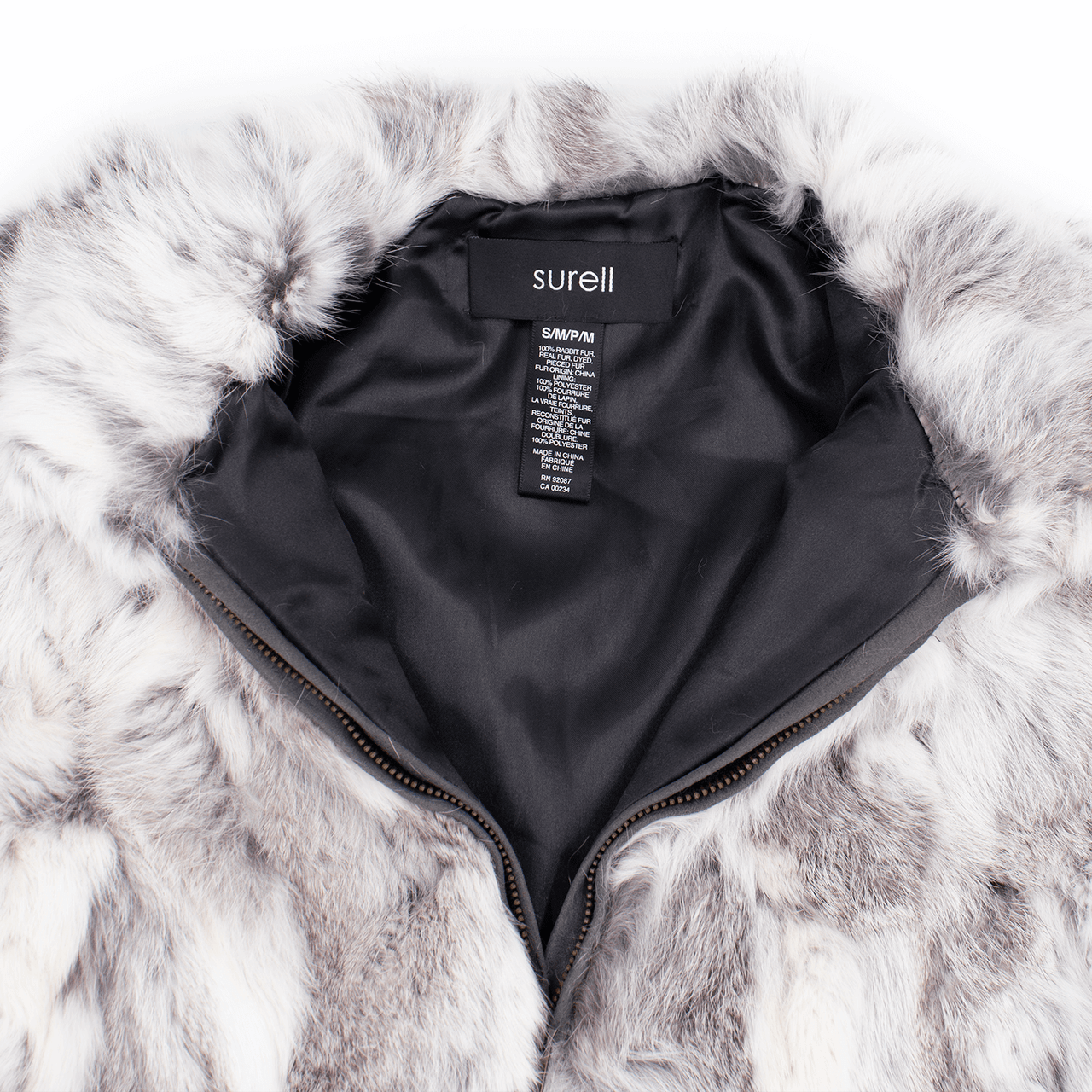 White and gray rabbit fur vest unzipped halfway