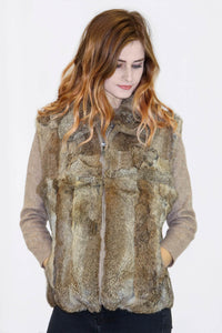 Women wearing a brown rabbit fur vest