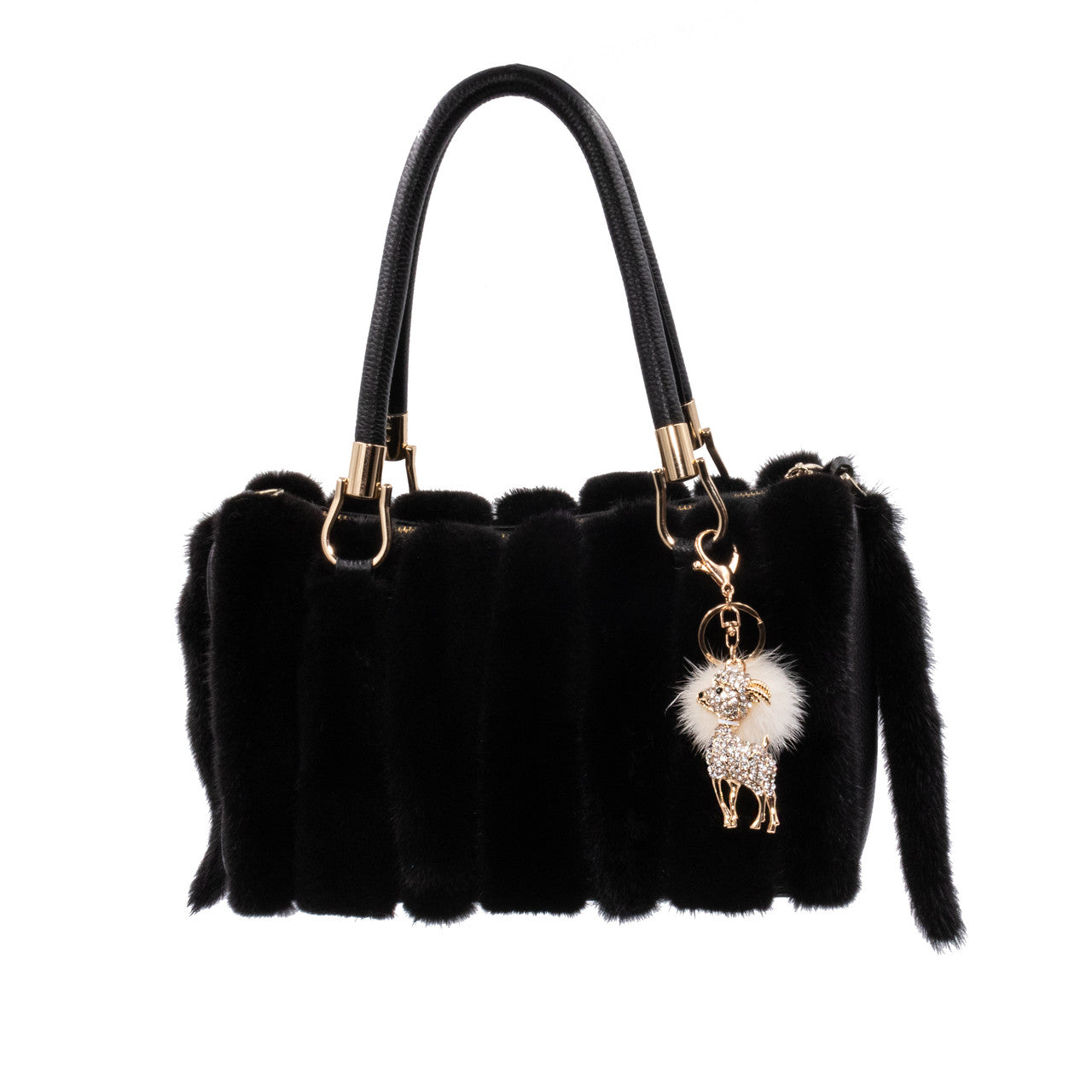 Mink Bling Lamb Keychain with White Pom hangs on the side of a black mink bag. 