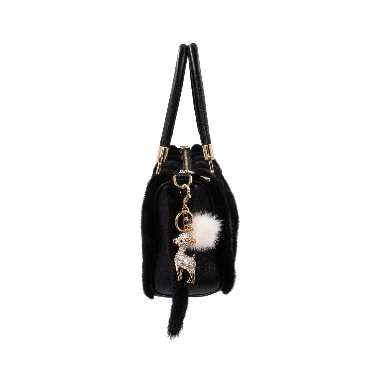 Mink Bling Lamb Keychain with White Pom hangs on the back of a black mink bag. 