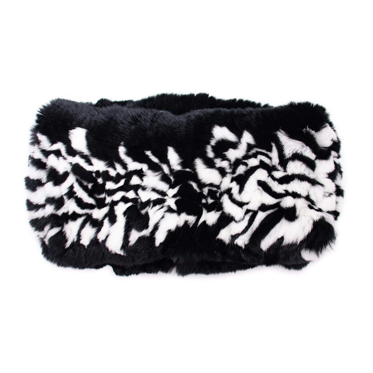 Back of a black and white real fur headband laying flat